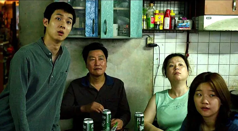 Song Kang-ho, Jang Hye-jin, Choi Woo-sik, and Park So-dam in Parasite (2019)